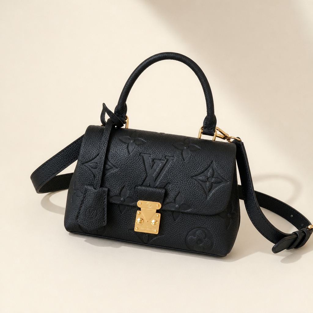 Embossed Monogram Top Handle Bag — hero