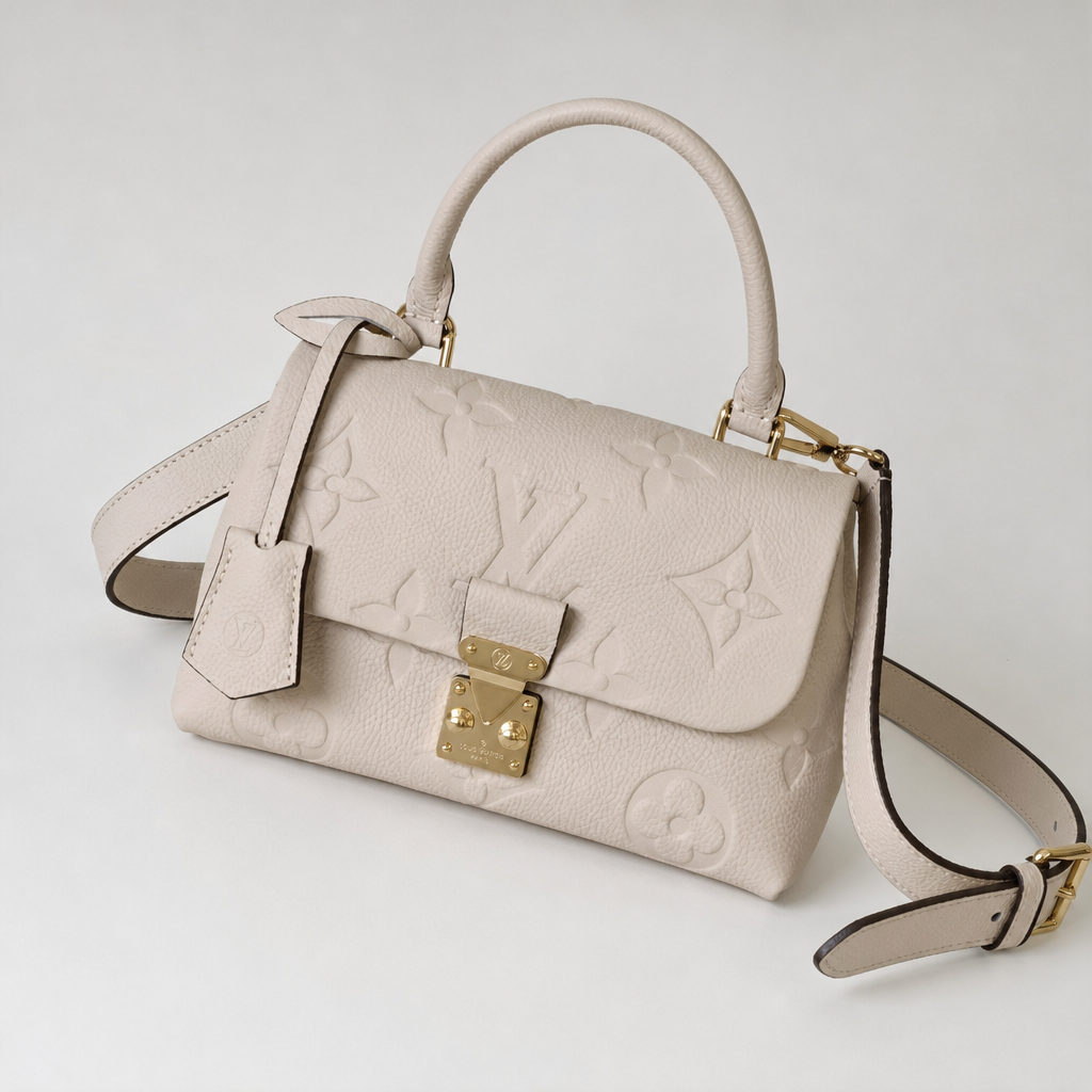 Embossed Monogram Top Handle Bag — variant 002