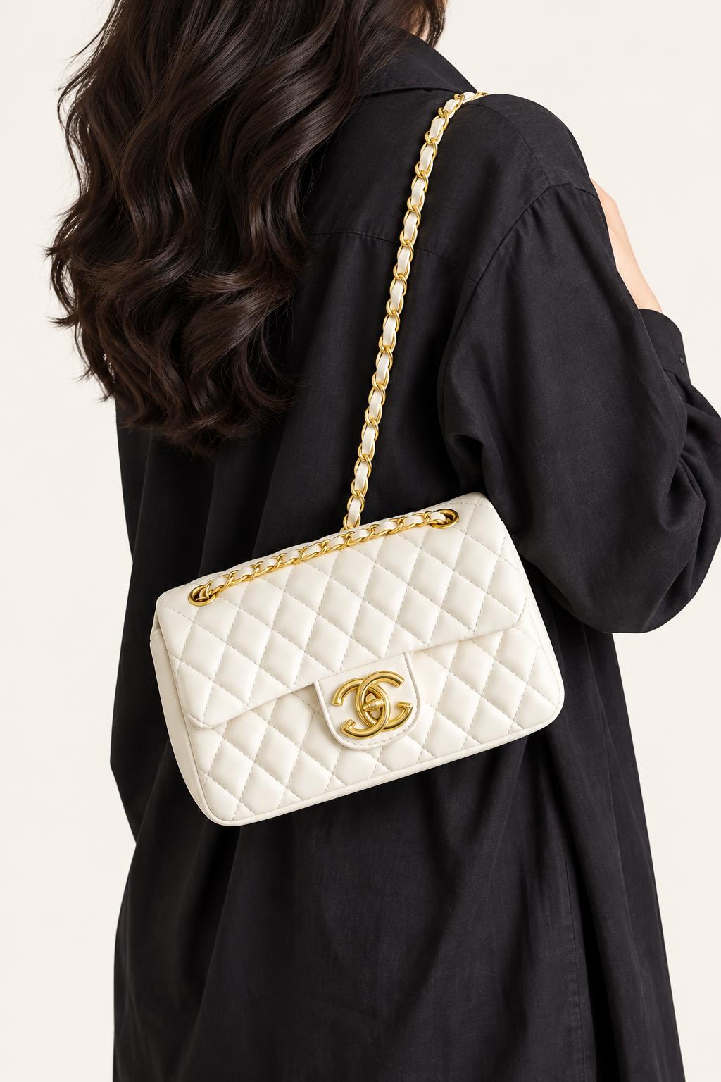 Women's The Quilted Chain Flap Crossbody Bag — carrying view