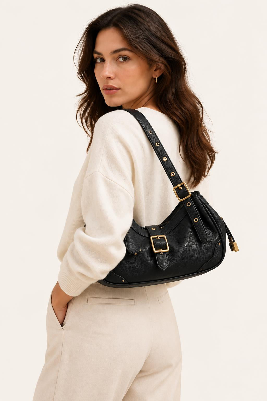 Buckle-Detail Slouchy Shoulder Bag — carrying view