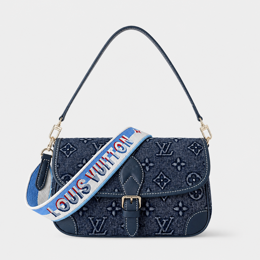 Dark blue denim-like monogram with wide strap — front view.