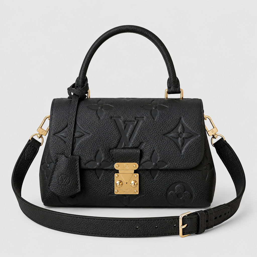 Medium black embossed monogram, wide strap — front view.
