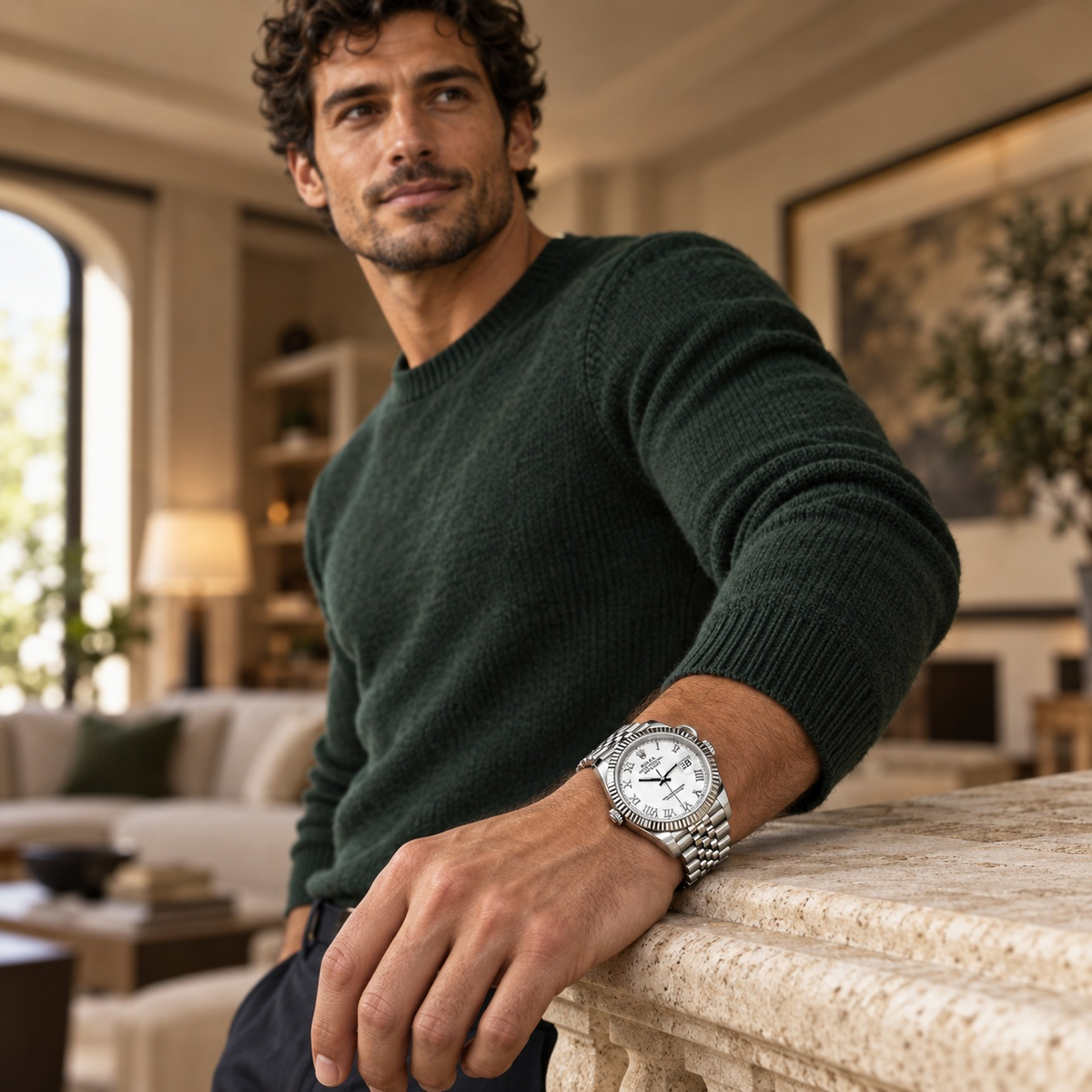 Fluted-Bezel Date Bracelet Watch worn by a male model in a relaxed casual setting
